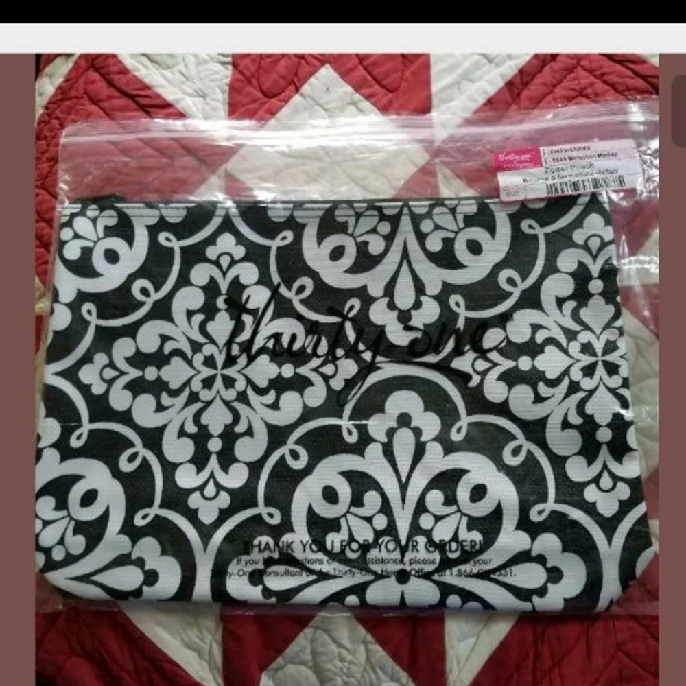 Thirty-one Medallion Meledy zipper pouch.
